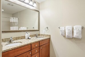 Double sinks in both Master bathrooms.