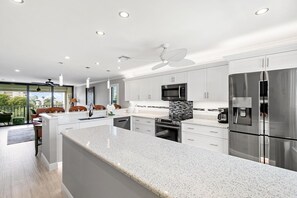 Fully updated kitchen with Quartz Counters and Stainless Steel Appliances
