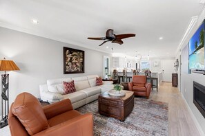 Family Room with Leather Furnishings, Smart TV and Fireplace