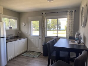 Spacious, fully equipped kitchen with all new appliances and view of the lake!