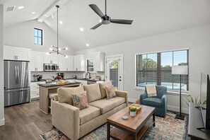 Sink into the comfy couch in the spacious living room.