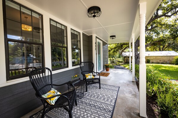 Enjoy your morning cup of coffee on the front porch.