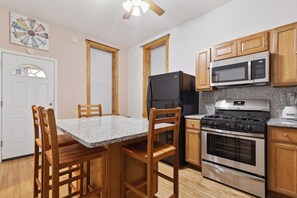 Indoors, Kitchen, Microwave, Oven, Refrigerator