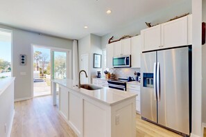 Lovely kitchen with plenty of counter space and stainless steel appliances