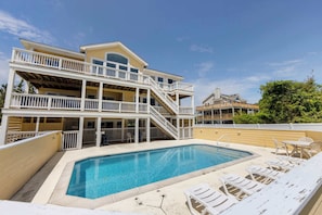 Pool with Outdoor Seating and Loungers
