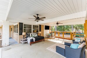 Covered patio leads to a large deck