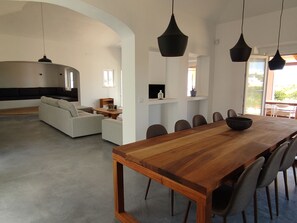 View of dinning room, living room and fire place