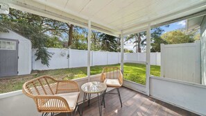 Enjoy the fresh air on your private, screened in patio!