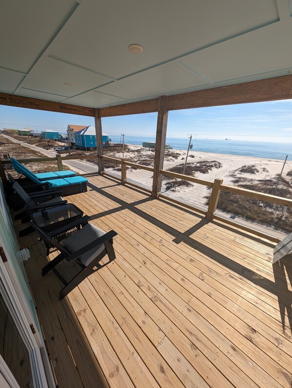 RELAX and ENJOY the incredible view on the comfy  furniture on the COVERED deck!