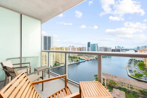 Seventeen stories high, where each glance from the balcony reveals a canvas of water, boats, and breathtaking skies
