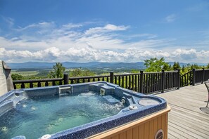 With amenities like a private hot tub and fire pit 