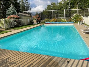 Dive into relaxation at our shared outdoor pool: Available June - September Open 09:00 AM - 08:00 PM