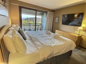 Experience the pinnacle of comfort and sophistication in our king bedroom,  with a sumptuous down blanket and all-new hotel-like linens.