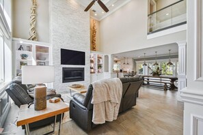 Living room with vaulted ceilings