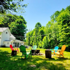 backyard with fire pit and plenty of seating