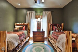 Bedroom 2- Features two single beds with ample room