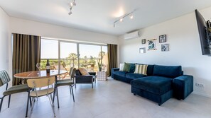 This bright and spacious living room has a cozy sofa, a table and a large window overlooking the balcony
#balcony #bright #relax #comfy #algarve #portugal