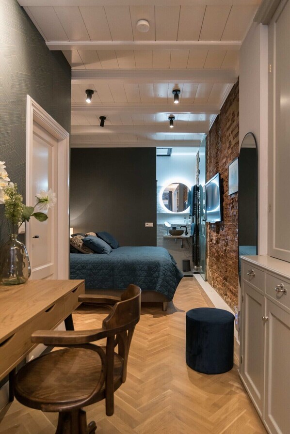 Bedroom with door to the Bathroom
