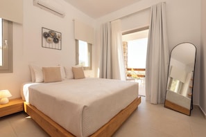 The bedroom exudes comfort and sophistication, featuring a spacious closet.