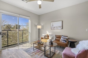 Living room; note that your living room layout and decor might be slightly different since we have multiple units in this building with slightly different layouts!