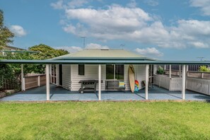 Large secure grass backyard and patio
