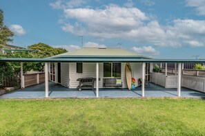 Large secure grass backyard and patio
