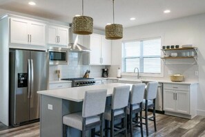 Kitchen Island open to the dining table and living room