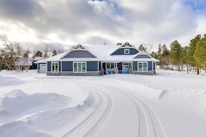 Cabin Exterior | Heated Garage (5 Vehicles) | Driveway (10 Vehicles)