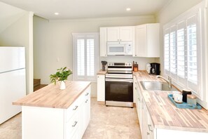 Fully equipped kitchen with modern amenities.