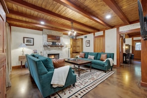 Two lush, comfortable living rooms between two houses on the estate