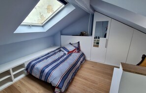 Attic bedroom with own sink
