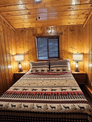 The bedroom also has windows, USB plugs in the lamps and a bench.