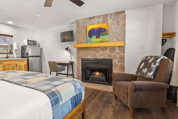 This hotel-style room has a comfortable king bed, kitchenette and bathroom.