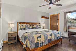 The room has a window for light and hooks and boot tray by the door.