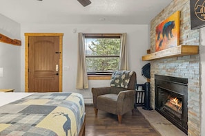 Curl up by the electric fireplace insert or watch TV on the HD TV.