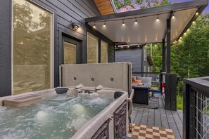 As the evening starts, enjoy your very own private patio decking with outdoor furniture seating with a firepit and easy access straight into your private hot tub, ready and waiting to wash away the stresses of the modern day hustle and bustle