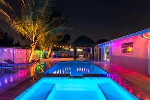 Heated Saltwater Pool & Spa By Night