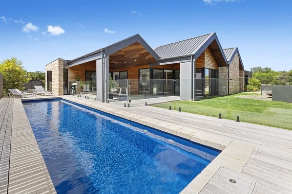 Solar-heated lap pool and gable architecture