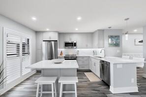 Gorgeous Kitchen with Quartz Countertops and Stainless Steel Appliances