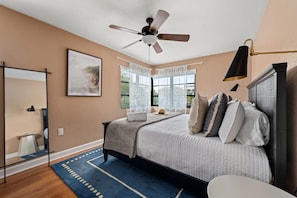 Rejuvenate in our spacious king-size bedroom, featuring a full-body mirror for those last-minute outfit checks and a restful night's sleep.