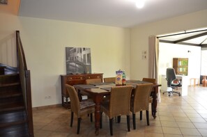 living room with table and 6 chairs