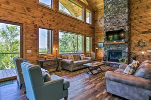 Tall ceilings and fireplace to enjoy the views!