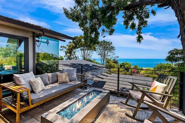 Outdoor patio with ocean views.