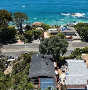 Three level mid-century modern/industrial design home with beautiful ocean views for days.
