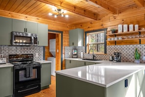 The large chef's kitchen contains all the equipment you need to whip up a feast.