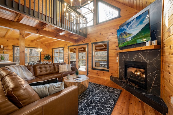 Friends & family can all gather in the living room to enjoy the fire or watch TV
