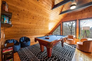 Enjoy a game of pool, board games or coffee and the house's best view.