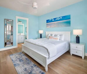 Serene bedroom retreat with calming blue accents and plush bedding for a peaceful rest.