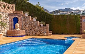 The pool with Frigiliana in the distance
