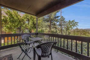 This homey condo is made even better when you step out onto the balcony and take in the awe-inspiring mountain views.